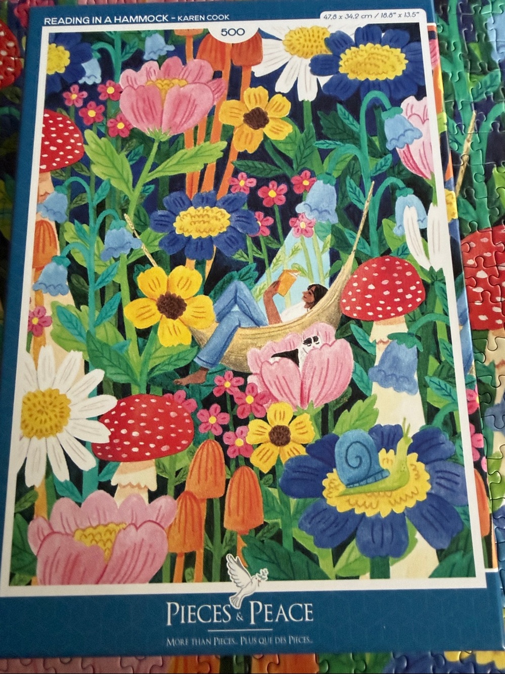 Puzzle by Pieces and Peace. 500ct. Reading in a Hammock